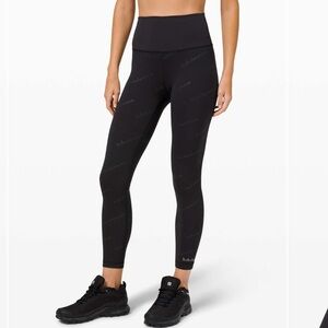 Lululemon Wunder Train High-Rise Tight 25" *Special Edition Black gold size 4
